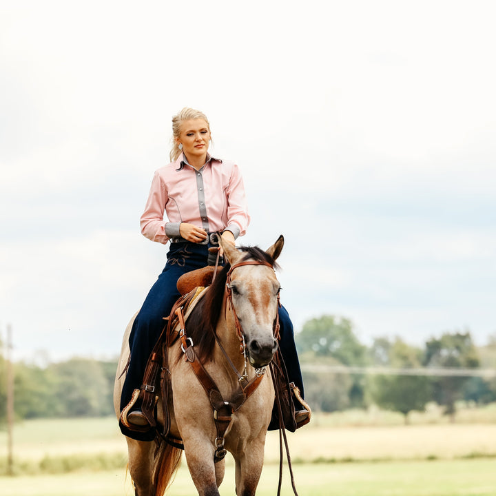 Model in studio setting posing in Carlee Pink Shirt by Kultured rider
