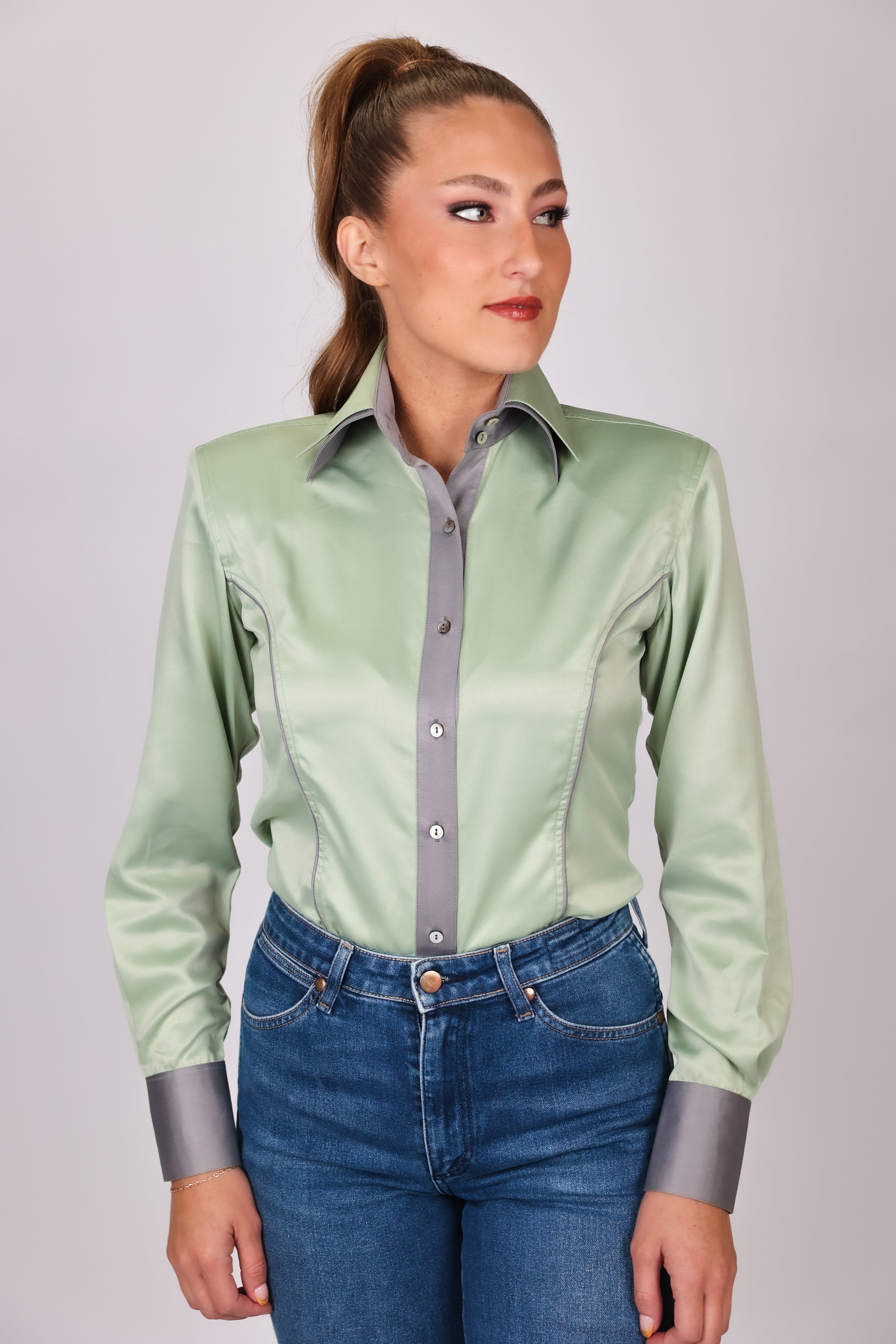 Model in studio setting posing in Carlee Mint Shirt by Kultured rider