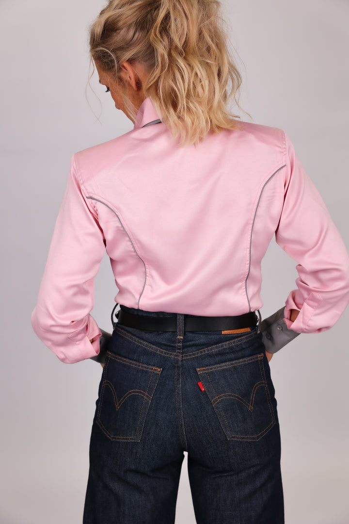 Model in studio setting posing in Carlee Pink Shirt by Kultured rider