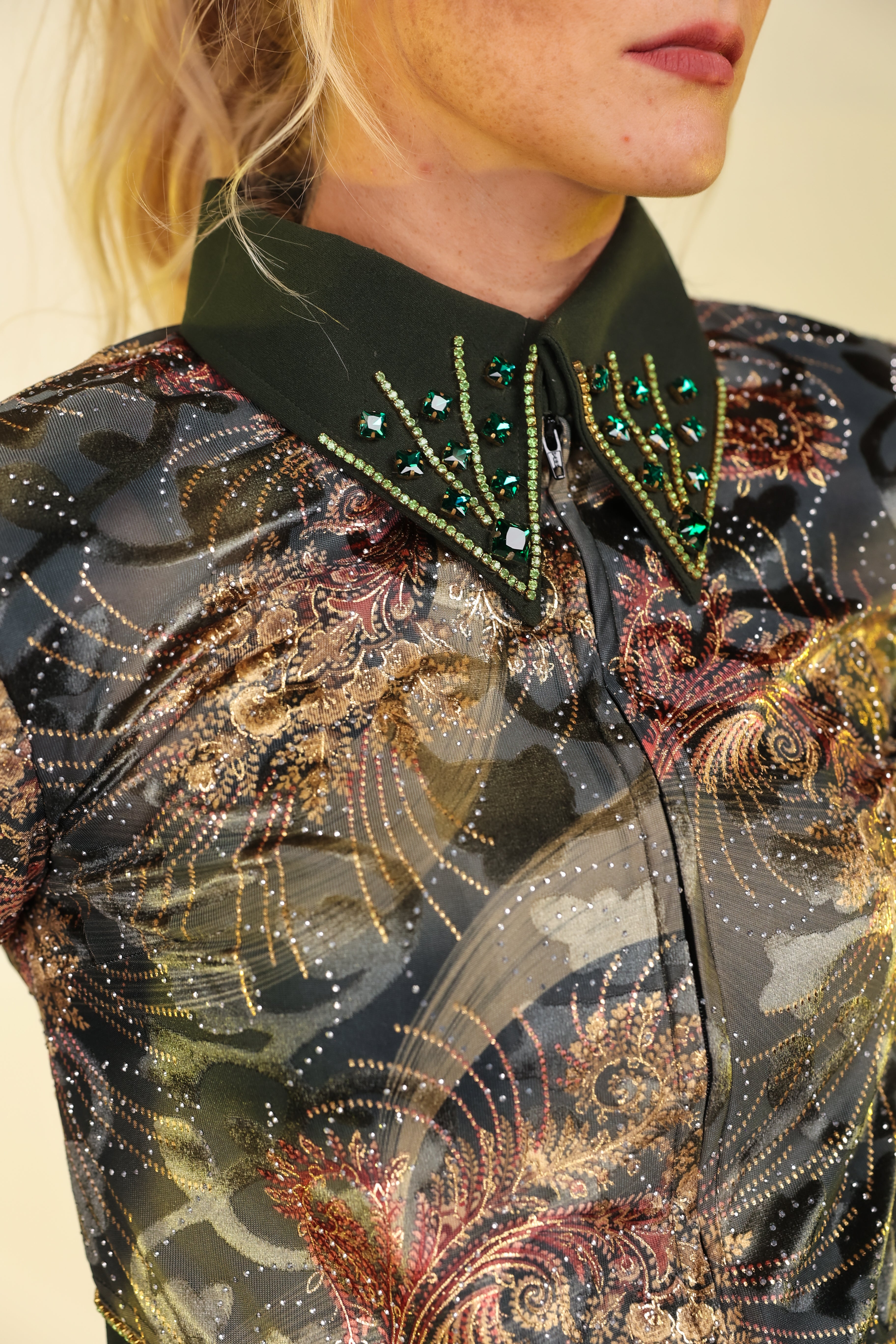 Model displaying collar details in Forest Green and Gold jacket by Kultured Rider