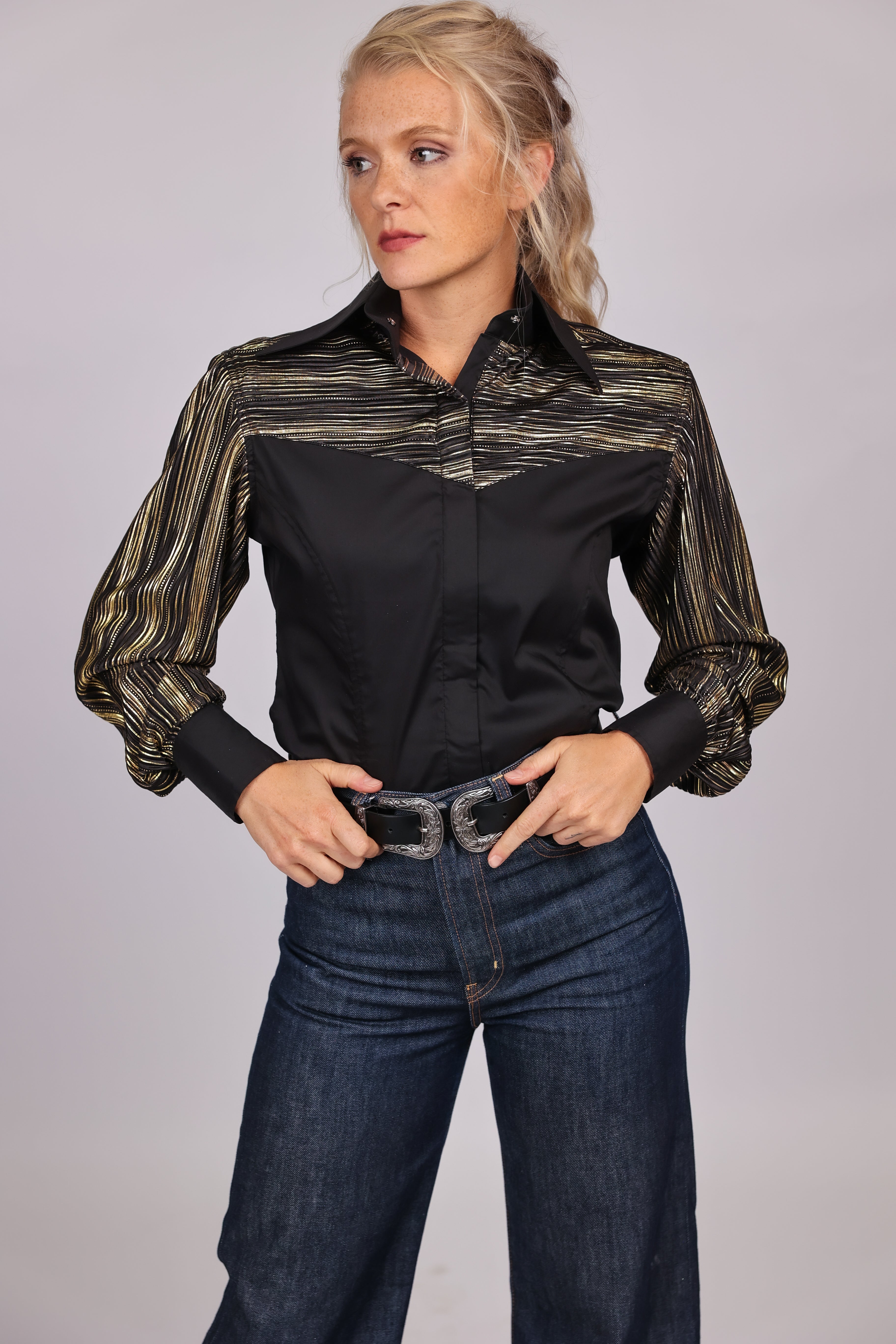 Model posing in Josie riding shirt from Urban cowgirl collection by Kultured Rider