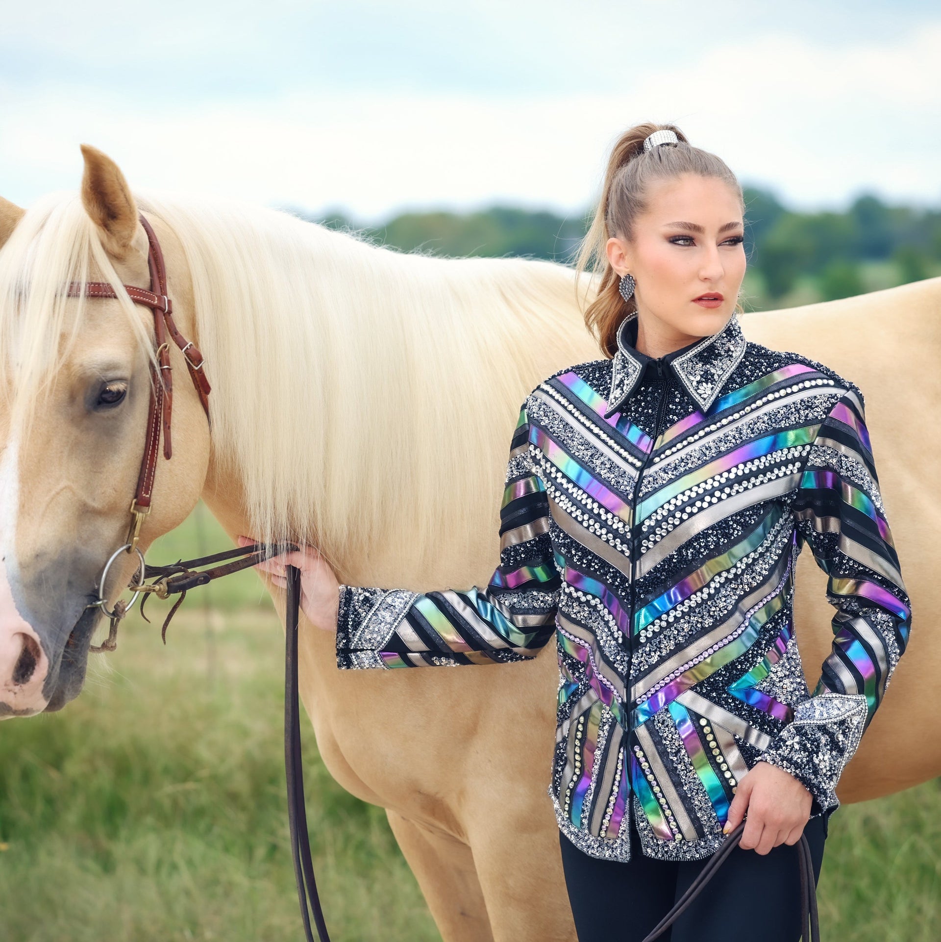 Model with horse posing in Yuki jacket by Kultured Rider