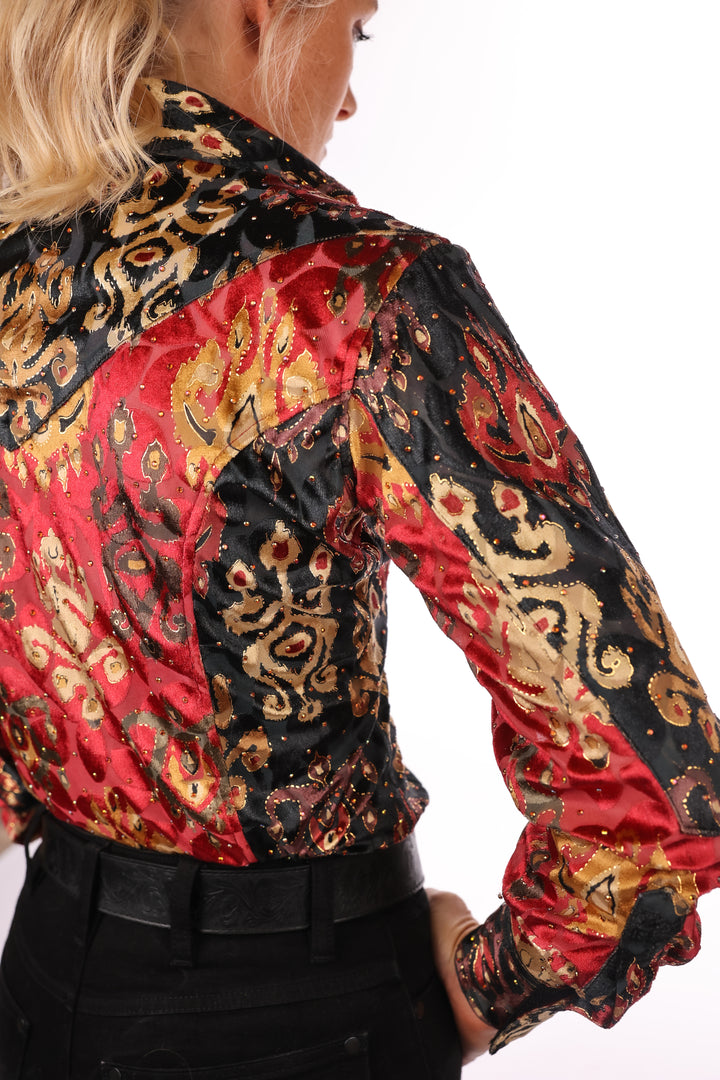 Model displaying the back of our red and black velvet riding shirt by Kultured Rider.