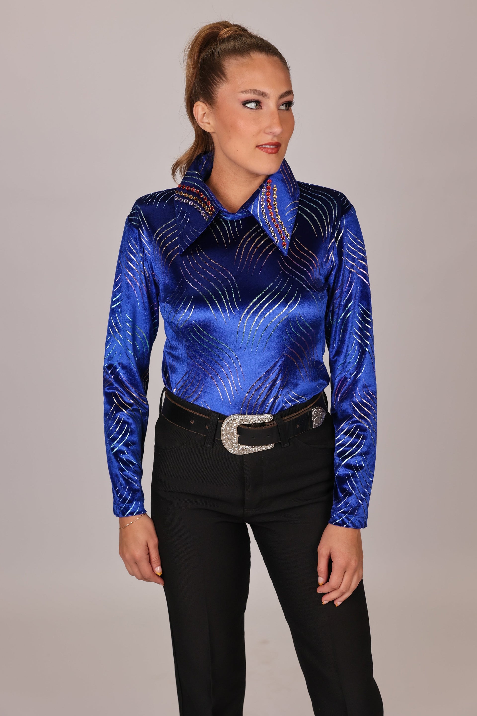 Model posing in blue shirt from velvet whisper collection by Kultured Rider