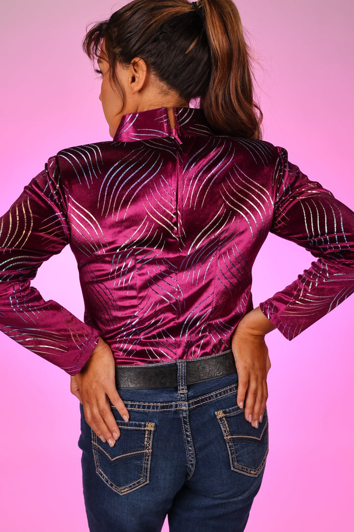 Model posing in magenta shirt from velvet whisper collection by Kultured Rider